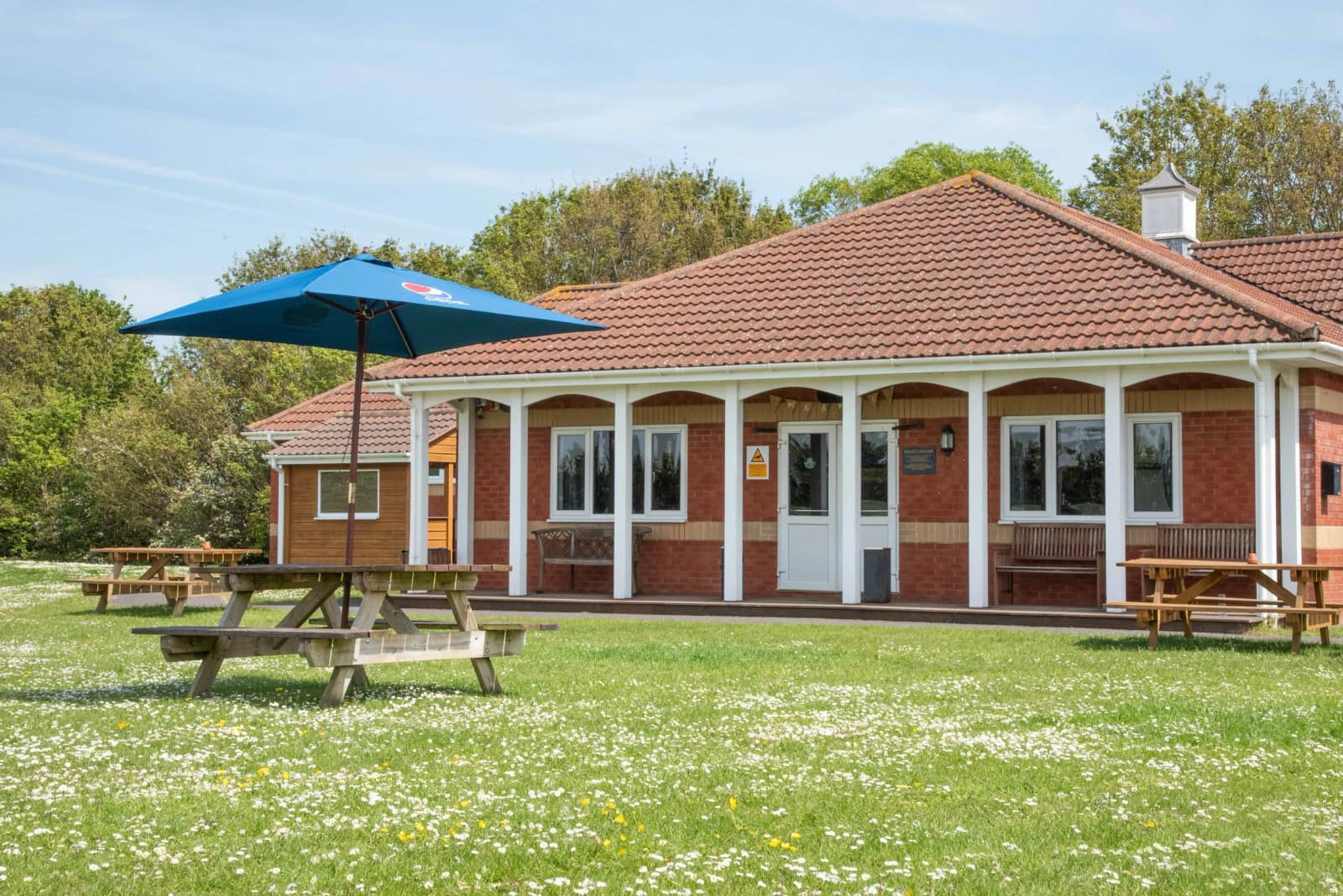 The clubhouse frontage with its umbrella